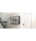 Agrupación de 24 buzones Prisma acceso frontal, distribuidos en grupos de 4, con cuerpo negro y puerta Inox. brillo