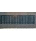 Agrupación de 104 buzones Univers, de color Antracita. Empotrados en la pared con tapajuntas del mismo tono.
