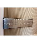 Agrupación de 17 buzones Libro V1100-04. Cuerpo Negro y puerta Inox Satinado. Colgados en la pared.