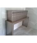 Agrupación de 16 buzones V1100-07- todo Inox Satinado. Todo el Mueble de Buzón Sobre la mesa Flat, Pintura Inox 