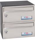 Buzones btv Barajas 26726, cuerpo negro pintado y puerta de acero inoxidable color Inox Brillo G2, para interior.