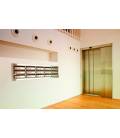 Agrupación de 15 buzones Sevilla, Inox Brillo. Encastrados en la pared y con tapajuntas inox brillo.