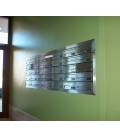 Instalación de SoloBuzones en C.P. Avda Roces, 1241-1271. Agrupación de 35 buzones Kompact h270, Pintura Inox