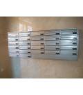 Instalación de SoloBuzones de SoloBuzones, Agrupación de27 buzones Kompact H360, con bandeja cerrada. Pintura Inox