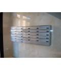 Instalación de SoloBuzones de SoloBuzones, Agrupación de27 buzones Kompact H360, con bandeja cerrada. Pintura Inox
