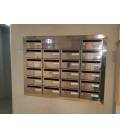 Instalación de SoloBuzones en Gijón- Agrupación de 22 buzones Hall 20-03212- Inox brillo AISI, empotrado en pared con tapajuntas